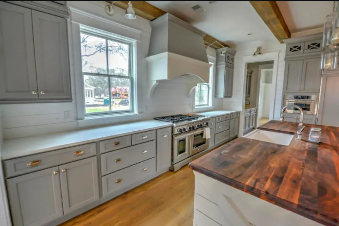 Lesesne Kitchen: Range wall, island, and custom cabinetry